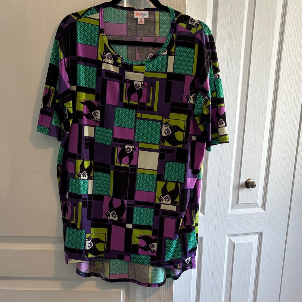 LuLaRoe Disney Irma Maleficent Purple and Green Geometric Blouse